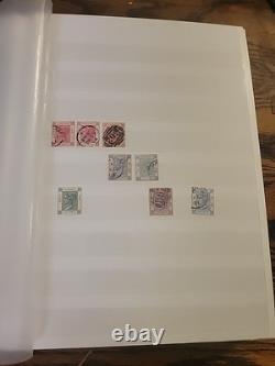 Collection de timbres du monde entier dans un album plein de timbres neufs et utilisés Royal Mail HK