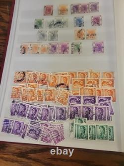Collection de timbres du monde entier dans un album plein de timbres neufs et utilisés Royal Mail HK