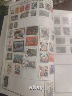 Collection de timbres du monde entier dans un bel album HE Harris. Super variété - Incroyable