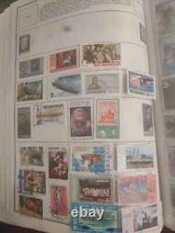 Collection de timbres du monde entier dans un bel album HE Harris. Super variété - Incroyable