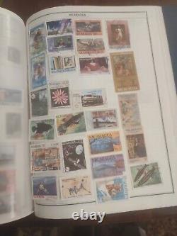 Collection de timbres du monde entier dans un bel album HE Harris. Super variété - Incroyable