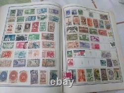 Collection de timbres du monde entier dans un énorme album Harris Ambassador de 1960. Valeur en espèces élevée