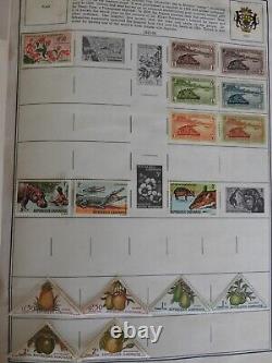 Collection de timbres du monde entier de plus de 3500 timbres dans l'album de luxe Harris Deluxe Stateman de 1969 de G à Z