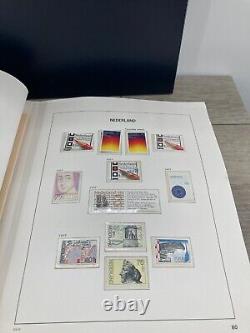 Collection de timbres étrangers non utilisés du livre d'albums Vintage Davo Pays-Bas III