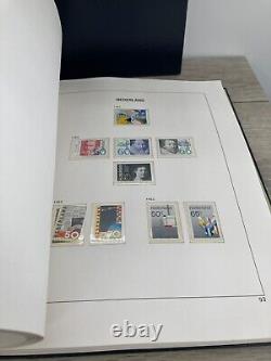 Collection de timbres étrangers non utilisés du livre d'albums Vintage Davo Pays-Bas III