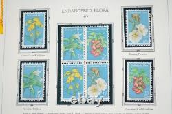 Collection de timbres neufs de 725+ et 4 feuillets des États-Unis 1979-1988 dans un album White Ace