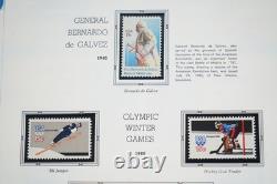 Collection de timbres neufs de 725+ et 4 feuillets des États-Unis 1979-1988 dans un album White Ace