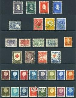 Collection de timbres neufs et oblitérés de 1927 à 2010 dans 3 albums. Valeur catalogue £2,688.00.