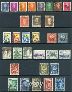 Collection de timbres neufs et oblitérés de 1927 à 2010 dans 3 albums. Valeur catalogue £2,688.00.