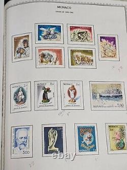 Collection de timbres neufs principalement de Monaco dans un album Minkus