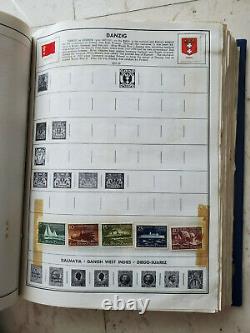 Collection de timbres-poste internationaux de la Monnaie dans l'album de luxe Statesman ++