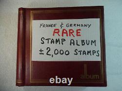 Collection de timbres rares vintage et anciens de France et d'Allemagne avec 2 000 timbres dans un album StampBook2