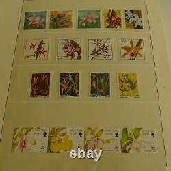 Collection de timbres sur le thème des orchidées dans l'album Lindner NIB