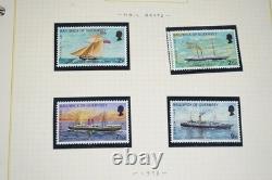 Collection des îles britanniques de plus de 1 000 timbres, principalement neufs sans charnière, conservés dans un album