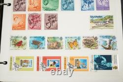 Collection du Commonwealth Britannique de plus de 1 900 timbres neufs et usagés dans un album