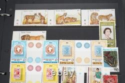 Collection du Commonwealth Britannique de plus de 1 900 timbres neufs et usagés dans un album