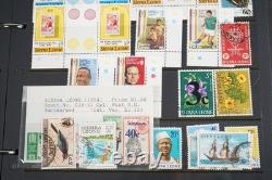 Collection du Commonwealth Britannique de plus de 1 900 timbres neufs et usagés dans un album