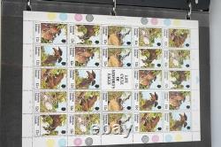 Collection du Commonwealth Britannique de plus de 1 900 timbres neufs et usagés dans un album