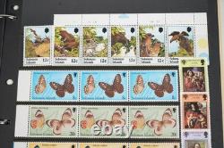 Collection du Commonwealth Britannique de plus de 1 900 timbres neufs et usagés dans un album