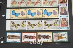 Collection du Commonwealth Britannique de plus de 1 900 timbres neufs et usagés dans un album