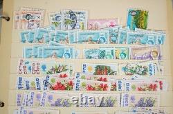 Collection du Commonwealth britannique de plus de 1 700 timbres oblitérés conservés dans un album