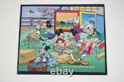 Collection mondiale Disney 1991 de 185 timbres et 70 feuilles, tous neufs dans un album