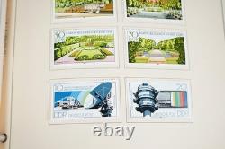 Collection mondiale G 1981-2000 de plus de 2 750 timbres neufs et oblitérés dans un album Scott