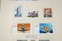 Collection mondiale G 1981-2000 de plus de 2 750 timbres neufs et oblitérés dans un album Scott