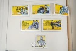 Collection mondiale G 1981-2000 de plus de 2 750 timbres neufs et oblitérés dans un album Scott