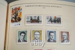 Collection mondiale G 1981-2000 de plus de 2 750 timbres neufs et oblitérés dans un album Scott