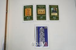 Collection mondiale G 1981-2000 de plus de 2 750 timbres neufs et oblitérés dans un album Scott