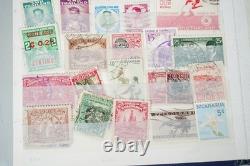 Collection mondiale de 1 375 timbres, principalement oblitérés, conservés dans un stockbook Cruiser
