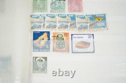 Collection mondiale de 1 375 timbres, principalement oblitérés, conservés dans un stockbook Cruiser
