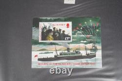 Collection mondiale de la Seconde Guerre mondiale de 120 timbres et 55 feuillets-souvenirs, tous neufs dans un album