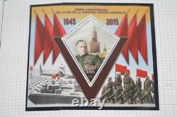 Collection mondiale de la Seconde Guerre mondiale de 165 timbres et 60 feuillets-souvenir stockés dans un album