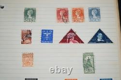 Collection mondiale de plus de 1 100 timbres neufs et oblitérés, conservés dans un album