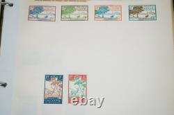 Collection mondiale de plus de 1 100 timbres neufs et oblitérés, conservés dans un album