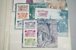 Collection mondiale de plus de 1 200 timbres neufs et usagés stockés dans un livre de collection Filabo