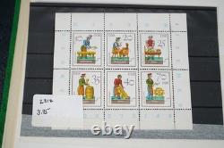 Collection mondiale de plus de 1 200 timbres neufs et usagés stockés dans un livre de collection Filabo