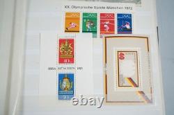Collection mondiale de plus de 1 200 timbres neufs et usagés stockés dans un livre de collection Filabo