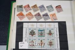 Collection mondiale de plus de 1 200 timbres neufs et usagés stockés dans un livre de collection Filabo