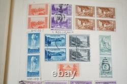 Collection mondiale de plus de 1 400 timbres neufs et oblitérés conservés dans un album