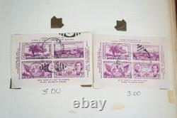 Collection mondiale de plus de 1 400 timbres neufs et oblitérés conservés dans un album