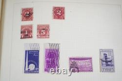 Collection mondiale de plus de 1 400 timbres neufs et oblitérés conservés dans un album