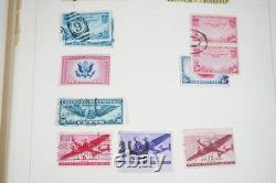 Collection mondiale de plus de 1 400 timbres neufs et oblitérés conservés dans un album