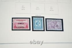Collection mondiale de plus de 1 400 timbres neufs et oblitérés, des années 1860 aux années 1980 environ, dans un album Scott