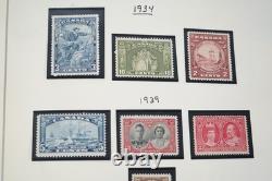 Collection mondiale de plus de 1 400 timbres neufs et oblitérés, des années 1860 aux années 1980 environ, dans un album Scott