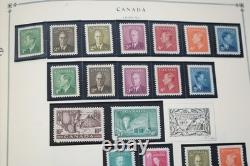 Collection mondiale de plus de 1 400 timbres neufs et oblitérés, des années 1860 aux années 1980 environ, dans un album Scott