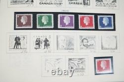 Collection mondiale de plus de 1 400 timbres neufs et oblitérés, des années 1860 aux années 1980 environ, dans un album Scott
