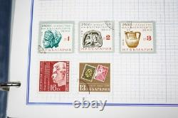 Collection mondiale de plus de 3 000 timbres neufs et utilisés stockés dans un album Mystic